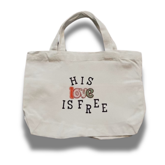 White His Love Is Free Tote Bag